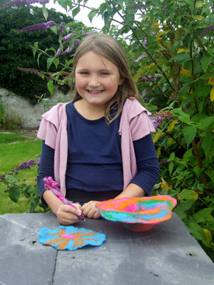 Elaine with one of her hand felted hats